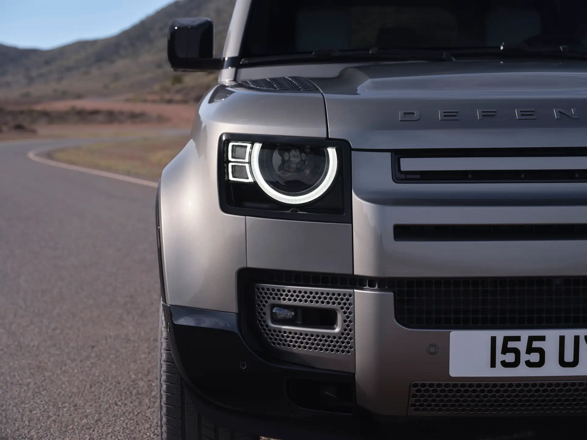 The front of a Land Rover Defender in detail.